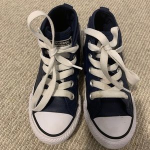 Converse high top leather boys sneakers in navy.